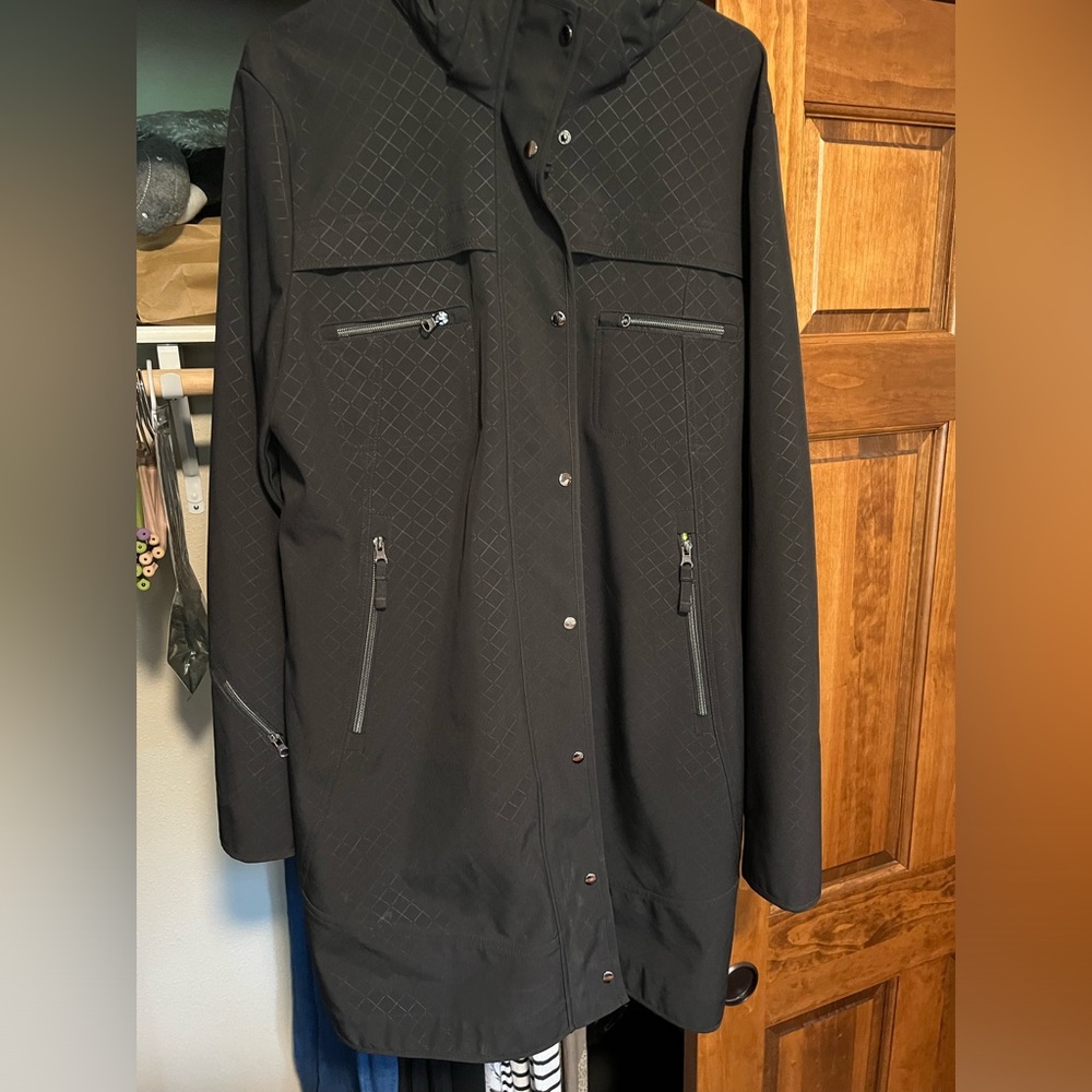 Brand new, super cute rain coat.